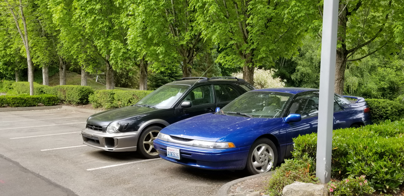 These two are parked there during the week, and prii take their place on the weekends.